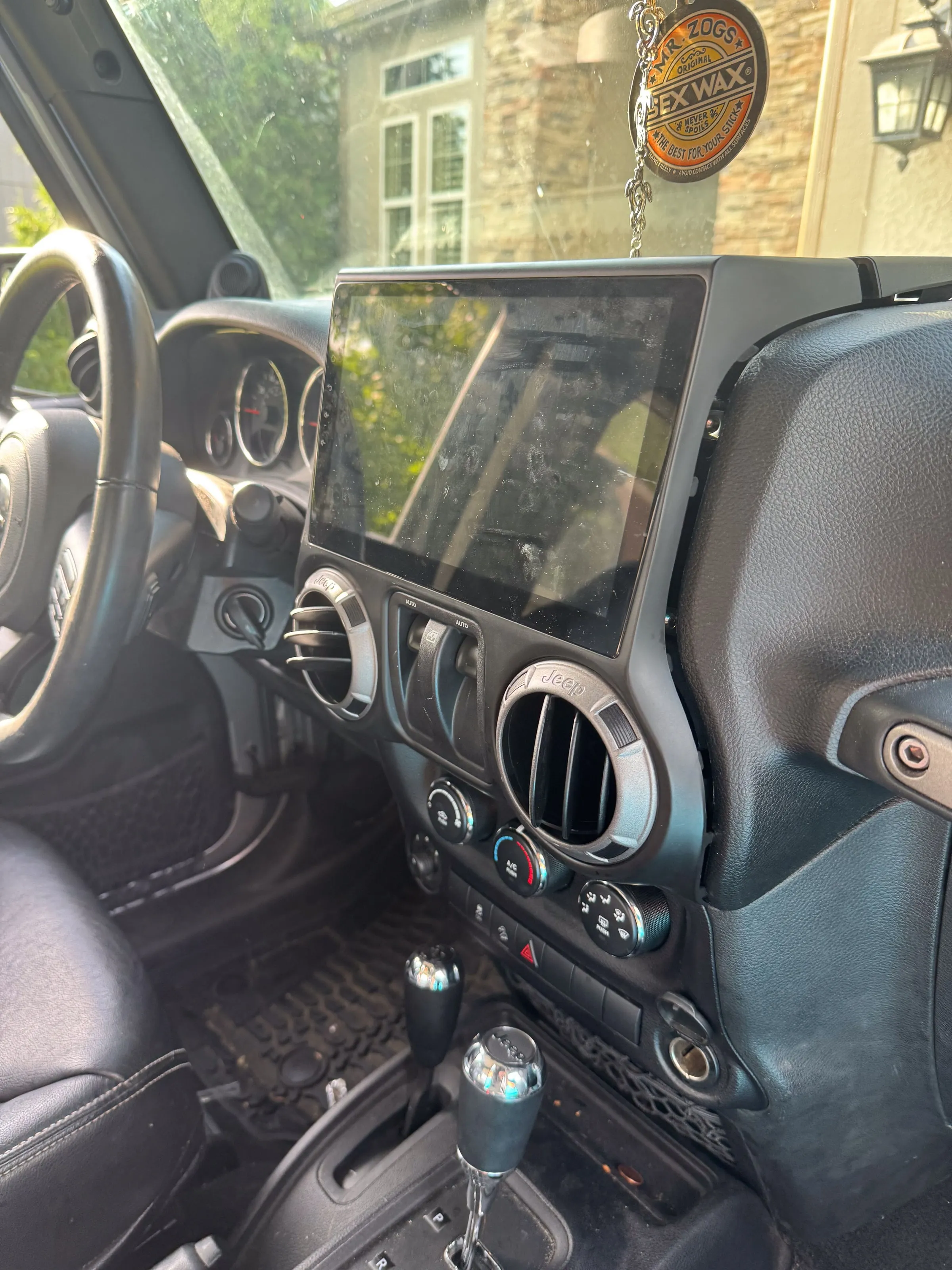 Before, Wrangler dash, dust across the screen to clear vents