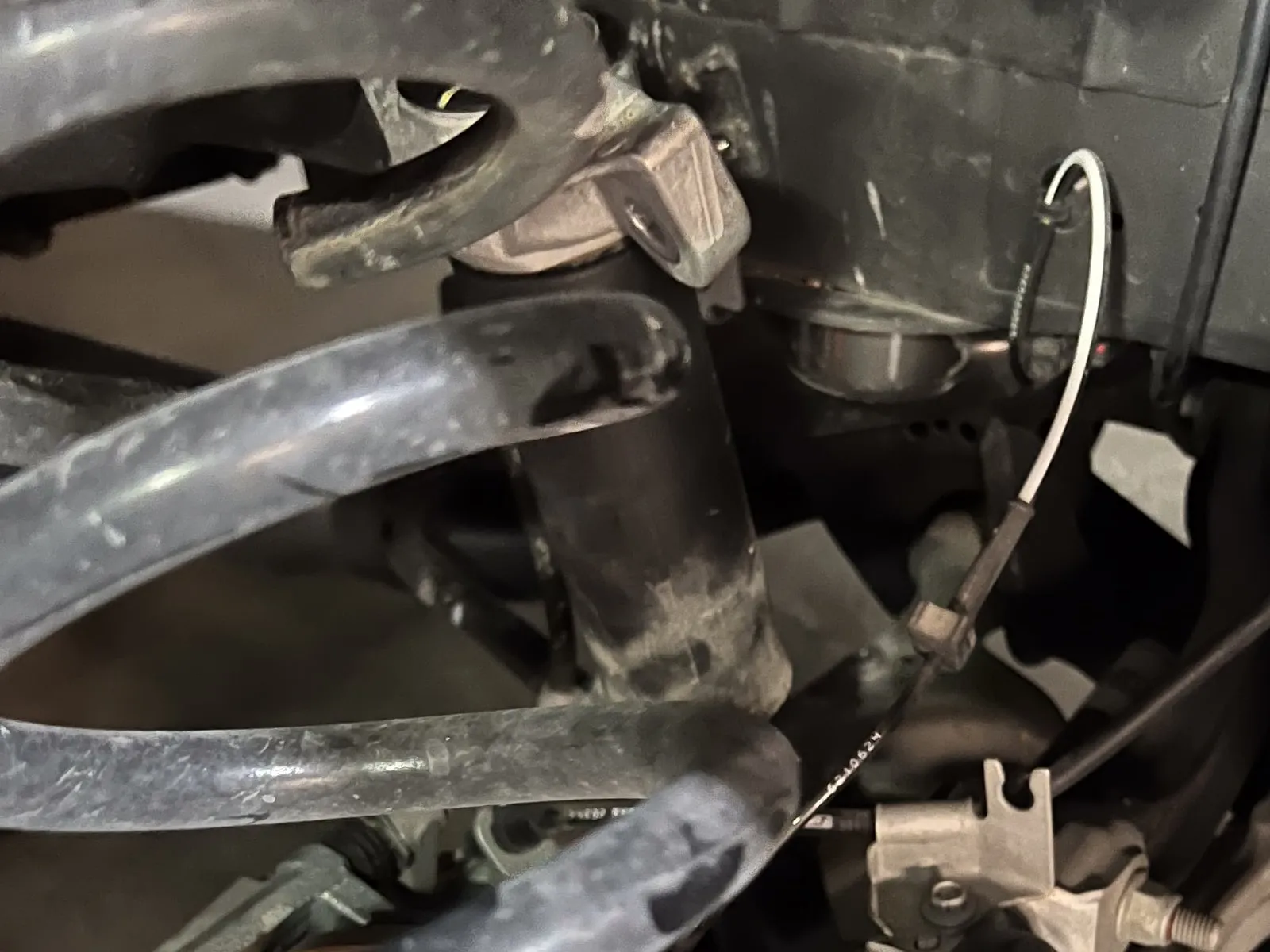Before. Factory coil out, Eibach lowering spring in