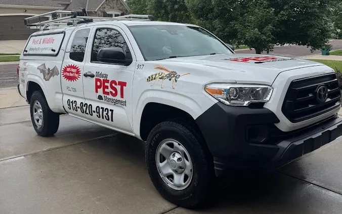 A branded work truck after detailing, parked in a driveway